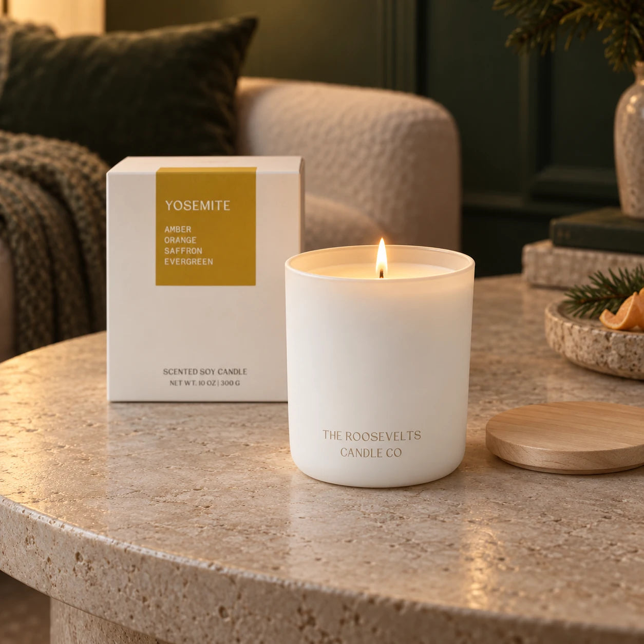 Yosemite Candle candle lit in a quiet forest-green interior